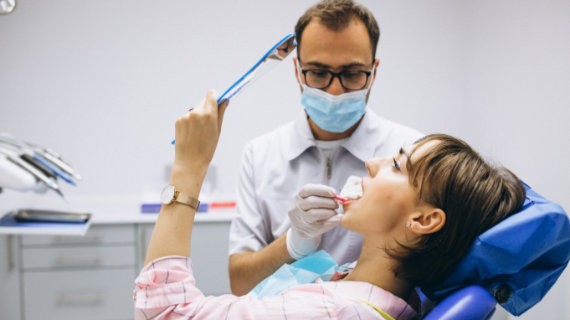 Dentist with a patient